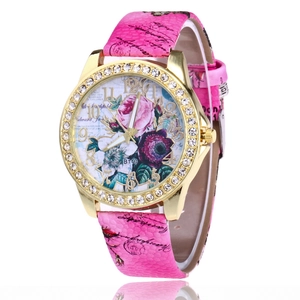 Women's rose gold rhinestone watch with floral dial and pink snake-print leather strap