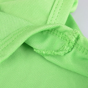 Bright green breathable mesh dog POLO shirt with durable double-stitched seam details