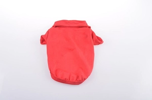 Flat lay of a red pet polo shirt for dogs featuring a classic ribbed collar and buttons