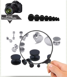 Detailed size comparison of black and silver titanium steel dumbbell stud earrings