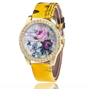 Golden rhinestone women's watch with yellow leather floral band and quartz movement
