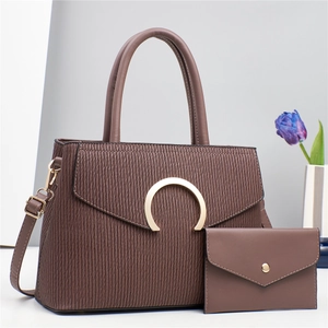 Minimalist coffee brown textured leather crossbody bag with small wallet and metal ring