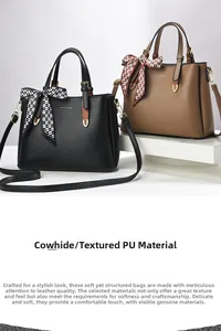 Detail of PU leather shoulder bag with decorative scarf and golden metal buckles