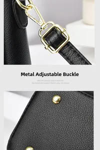 Detail of black lychee grain leather handbag with gold hardware hooks and metal rivets