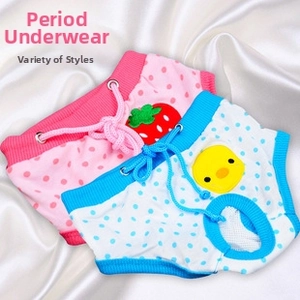 Detail of strawberry and duck embroidery on polka dot cotton pet physiological pants