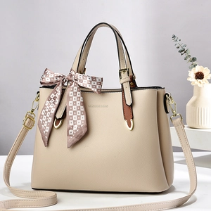 Chic beige textured leather crossbody phone bag with fashion lettering and silk scarf detail