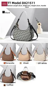 Detailed view of the 26cm retro crescent bag dimensions and geometric print details