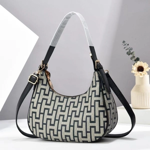 Fashionable geometric jacquard crescent hobo bag with black leather strap and gold hardware