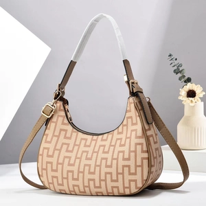 Minimalist crescent moon hobo bag in jacquard canvas with brown H-pattern and dual straps
