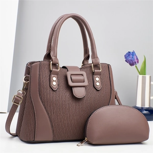 Brown faux leather crossbody handbag set with pleated texture and adjustable strap