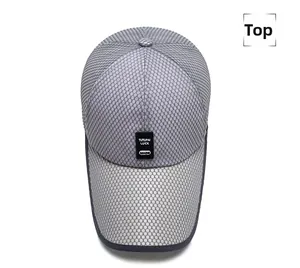 Top view of a grey breathable mesh baseball cap featuring a black rectangular brand label