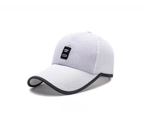 Close-up of white breathable mesh baseball cap with honeycomb pattern and logo patch