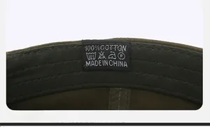 Detailed close-up of premium cotton baseball cap inner lining with washing label