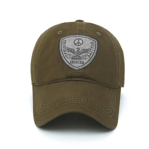 Olive green cotton baseball cap featuring military-style eagle shield embroidery