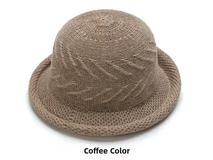Detail of coffee brown woven sun hat with unique textured leaf patterns and knit texture
