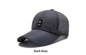 Detail of dark grey outdoor mesh cap with honeycomb texture and decorative patch