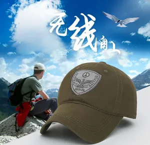 Close-up of olive green cotton military cap featuring vintage tactical shield embroidery