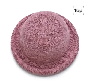 Top view of hollow woven dome sun hat in dusty rose with breathable knit texture