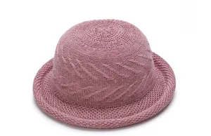 Detailed knit texture and hollow crochet pattern of the pink dome sun hat for women