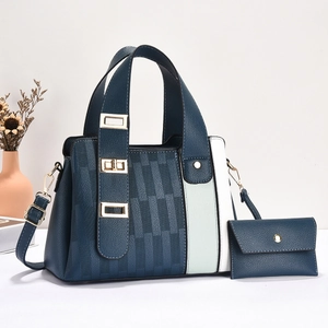 Blue lychee leather handbag set with color-blocking detail and gold buckle straps