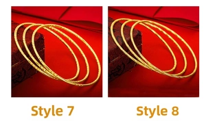 Detail of bohemian gold-plated bangles in style 7 and 8 with intricate textured patterns