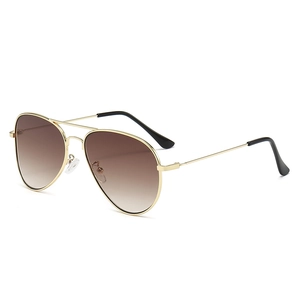 Classic aviator sunglasses with gold metal frame and brown gradient lenses at 45-degree angle