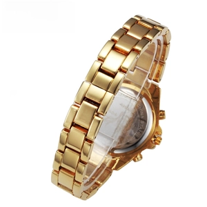 Close-up of the gold-tone alloy watch showing the stainless steel case back and link strap
