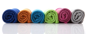 Macro detail of breathable honeycomb weave textures on multi-color cooling sports towels
