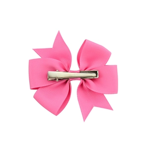 Handmade bright pink ribbed ribbon bow hair clip for girls with a silver metal alligator grip