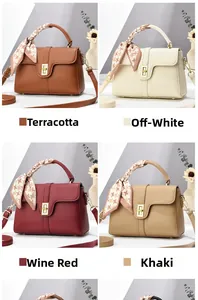 Litchi pattern handbags in four colors with scarf handle and gold twist lock