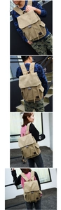 Detailansicht des khakifarbenen Canvas-Rucksacks mit Kordelzug und Magnetverschluss