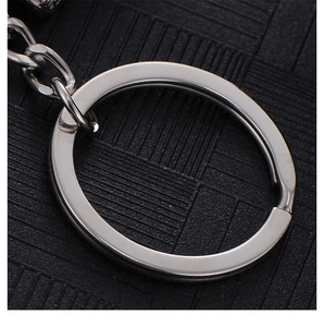 Macro detail of the polished silver stainless steel keyring with a sturdy link chain