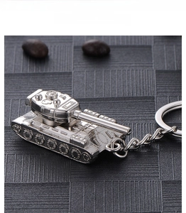 Macro shot of silver zinc alloy T34 tank keychain with detailed turret and metal ring