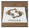 Close-up of a Pisces zodiac coffee stencil on a rustic wooden background texture