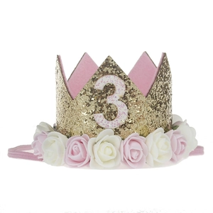 Detail of gold crown headband for age 3 with pink roses and elastic strap for girls