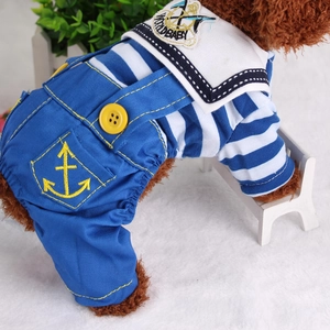 Dog sailor outfit with blue and white stripes and denim overalls on a white background