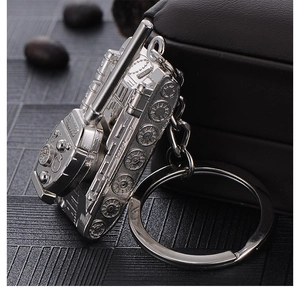 Macro view of silver alloy T34 tank keychain showing detailed barrel and tracks