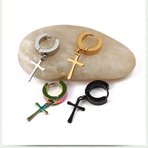 Detail view of cross hoop earrings in silver, gold, black and rainbow stainless steel