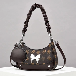 Brown monogram underarm shoulder bag with butterfly charm and small round coin purse