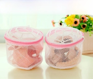 Cylindrical mesh laundry bags for delicate bras featuring protective pink zippers