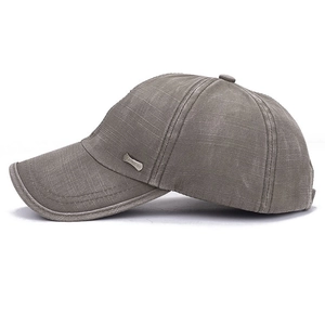 Classic dark grey washed cotton baseball cap with vintage finish and side metal logo