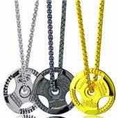 Detailed view of 45 lbs barbell weight plate necklaces in silver, gold, and black finishes