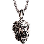 Detailed close-up of a silver lion head pendant with red gemstone eyes and intricate mane