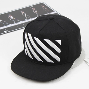 Close-up of white 3D embroidery diagonal stripes on black cotton snapback hat