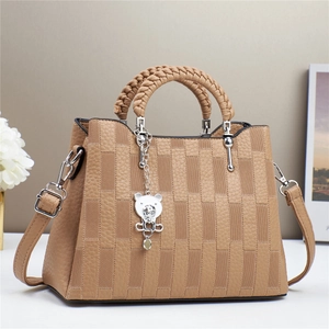 Khaki women hand bag with brick texture, woven handle and silver bear charm