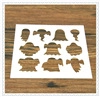 Detail of white plastic coffee stencil featuring various cartoon ghost patterns for DIY art