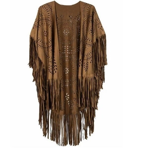 Close-up of brown faux suede poncho with circular hollow patterns and long fringe details