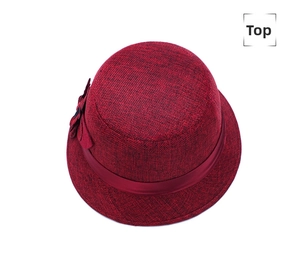 Top view of a dark red linen sun hat featuring an elegant fabric flower and satin ribbon