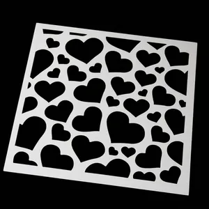Plastic heart pattern stencil for coffee, cake decorating and DIY painting on black background