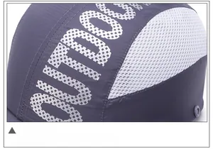 Detail of outdoor sun hat featuring breathable honeycomb mesh and silver outdoor text